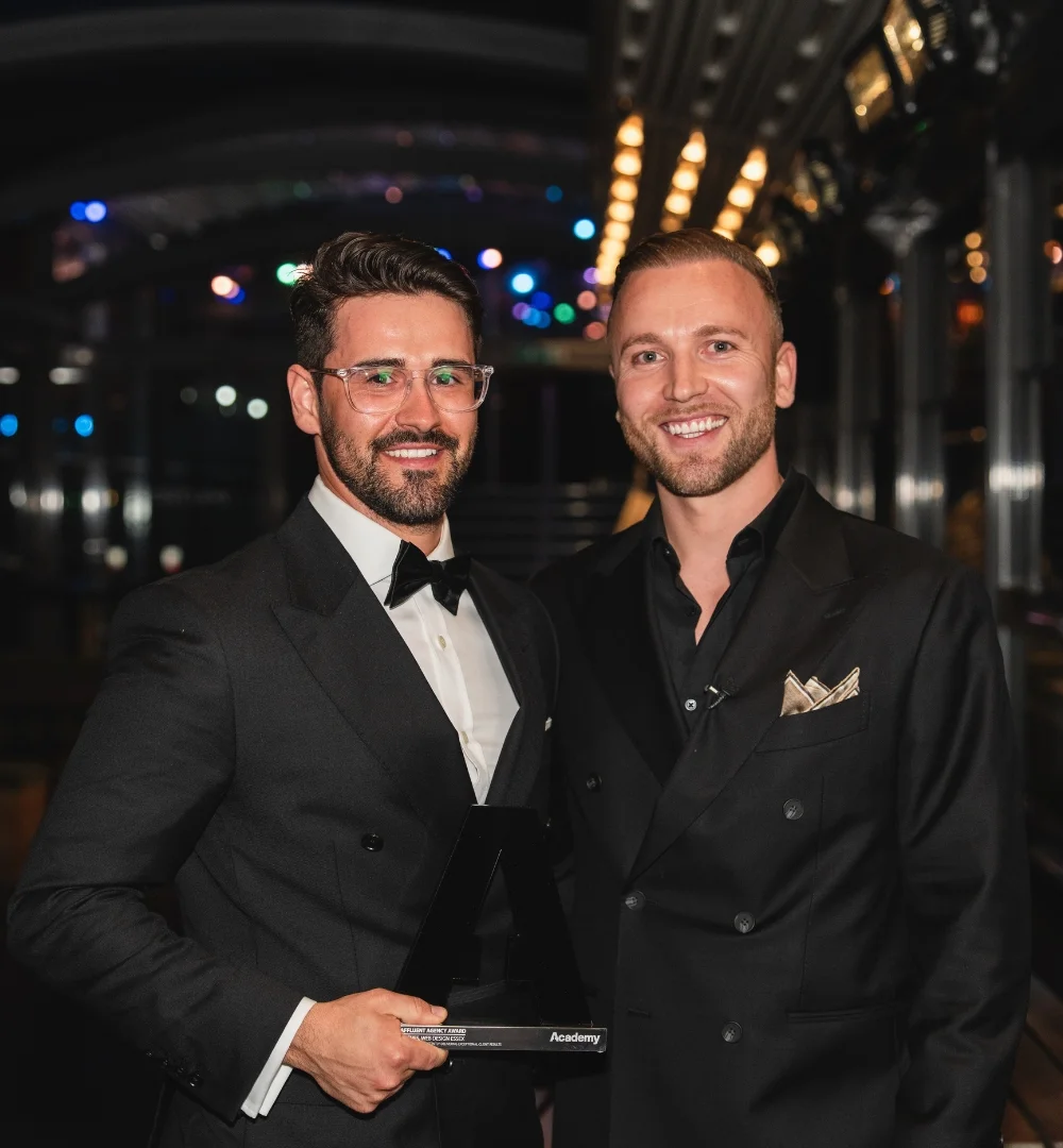 Ben Hughes and the SEO Essex team receiving a business excellence award for outstanding client results